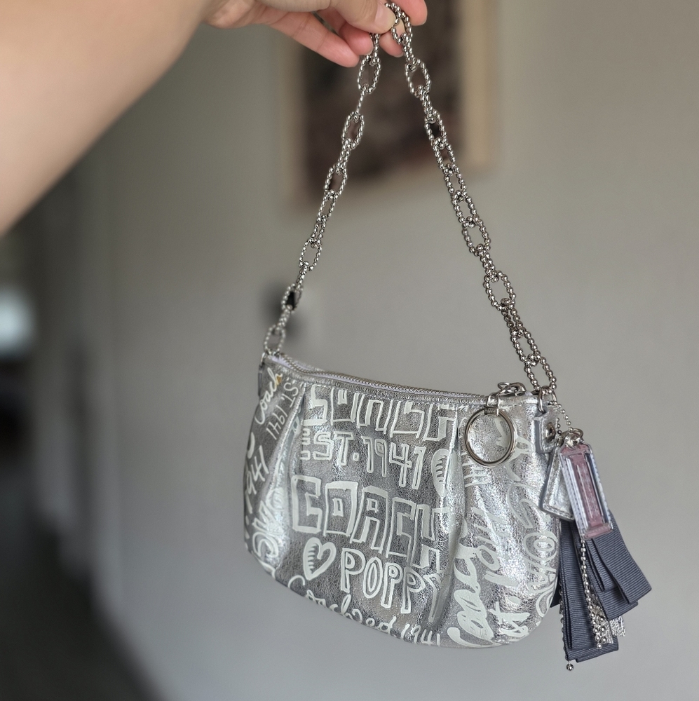 Coach Poppy Silver Graphic Wristlet